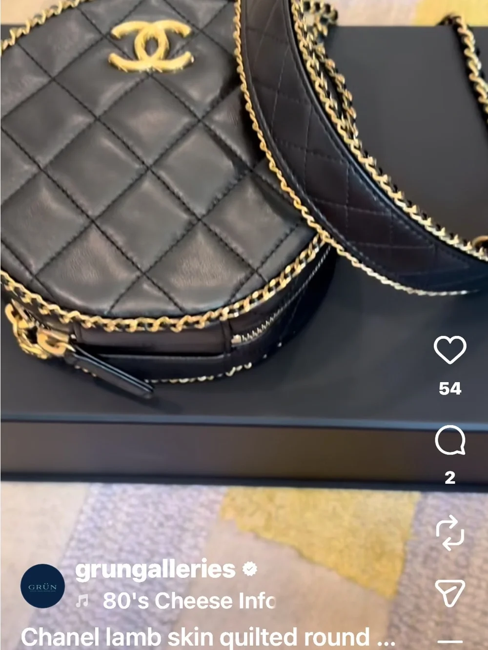 CHANEL Black Quilted Round Crossbody with Gold CC